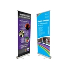 Rollo promocional del PVC de playa de las banderas de la exhibición retractable de aluminio de encargo al aire libre del soporte encima de la bandera proveedor
