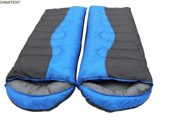 215 * 78CM de doble color exterior impermeable a agua 190T poliéster relleno de fibra hueca clásico dos personas en un saco de dormir proveedor