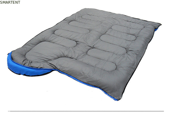 215 * 78CM de doble color exterior impermeable a agua 190T poliéster relleno de fibra hueca clásico dos personas en un saco de dormir proveedor