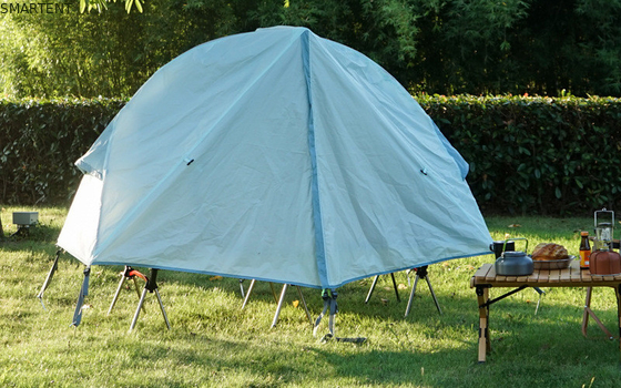 Explora el aire libre con nuestras tiendas de campamento al aire libre 200*120*95CM Azul 210D Poliéster Oxford Cama de tienda con cama plegable proveedor